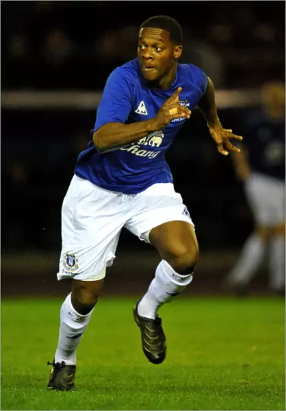 Everton's Determined Striker: Kieran Agard in Action