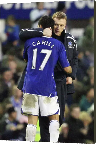 Everton's Glory: Moyes and Cahill Celebrate Premier League Victory over Portsmouth (2008)