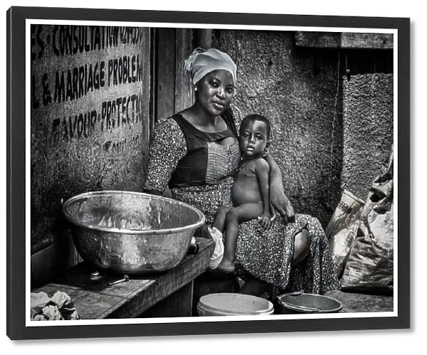 Mother and her child in the streets of Ghana