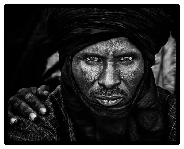 Peul man watching the gerewol festival-I - Niger