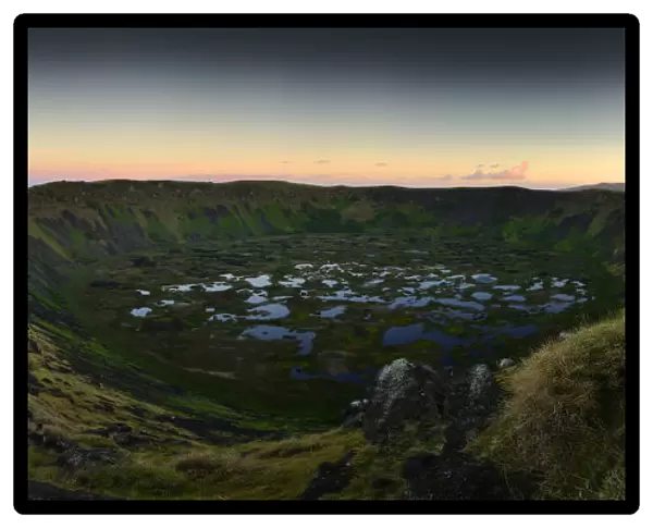 Rano Kau Volcano crater with lagoon and Motu islets in the sea, Easter Island, Pacific ocean