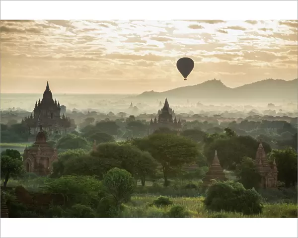 Hot air balloon over the Temples of Bagan at dawn, Myanmar, November 2012