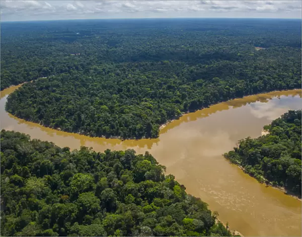 Aerial view of Mouth of the Yavari-Mirin River entering Yavari River and Amazon Rainforest
