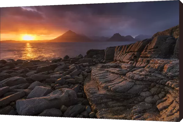 Sunset over the Cullin Mountains from Elgol shoreline, Isle of Skye, Scotland, UK, April