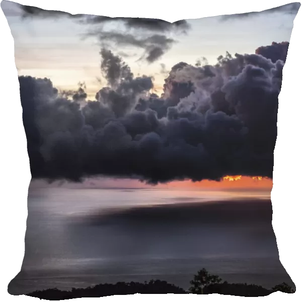 Dramatic sunset with storm clouds over Roseau, Caribbean sea view in Dominica, Lesser Antiles. September 2019