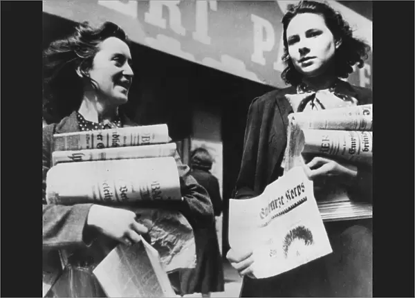 Women selling German newspapers, German-occupied Paris, 19 July 1940