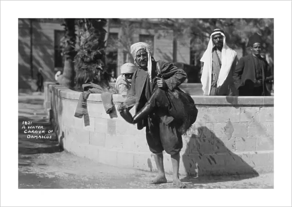 A water carrier in Damascus, Syria, c1920s-c1930s(?)