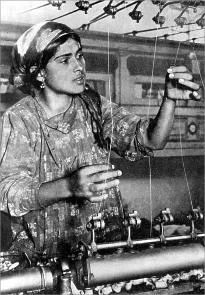 Woman working in the silk industry, Samarkand, Uzbekistan, 1936