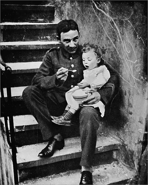 One of the New Army making himself useful in his billet, 1915