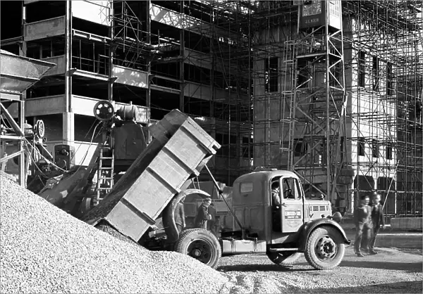 Early 1950s Bedford M Tipper delivering aggregates to a building site, South Yorkshire, July 1954