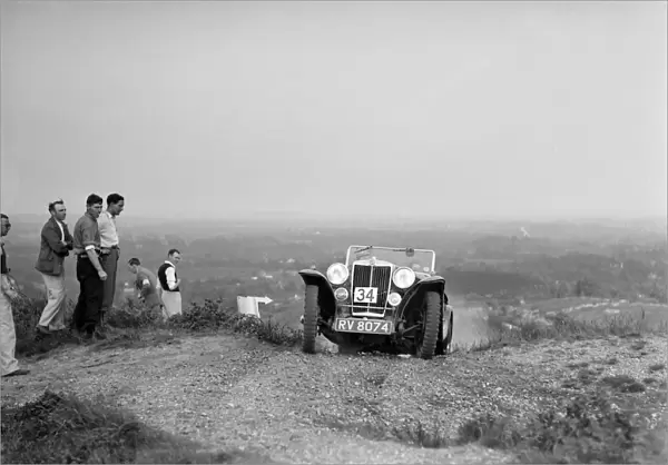 1936 MG PB 2-seater sports taking part in the NWLMC Lawrence Cup Trial, 1937. Artist: Bill Brunell