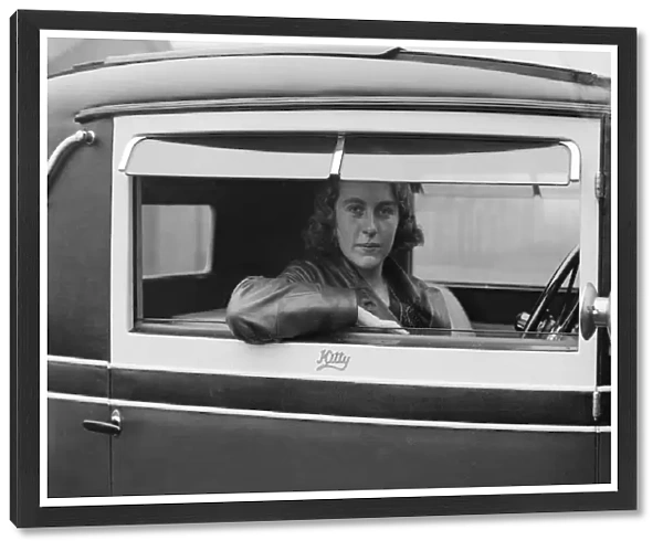 Kitty Brunell behind the wheel of a Talbot 14  /  45, c1930. Artist: Bill Brunell