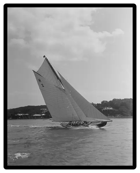 Verbena (H2), a gaff rig 8 Metre, sailing close-hauled, 1911. Creator: Kirk & Sons of Cowes