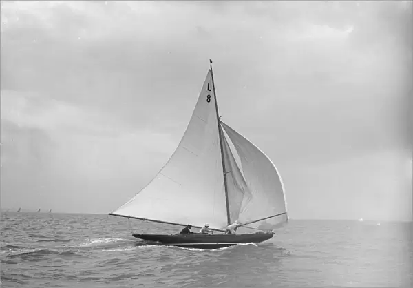 Scotia IV running downwind with spinnaker, 1913. Creator: Kirk & Sons of Cowes