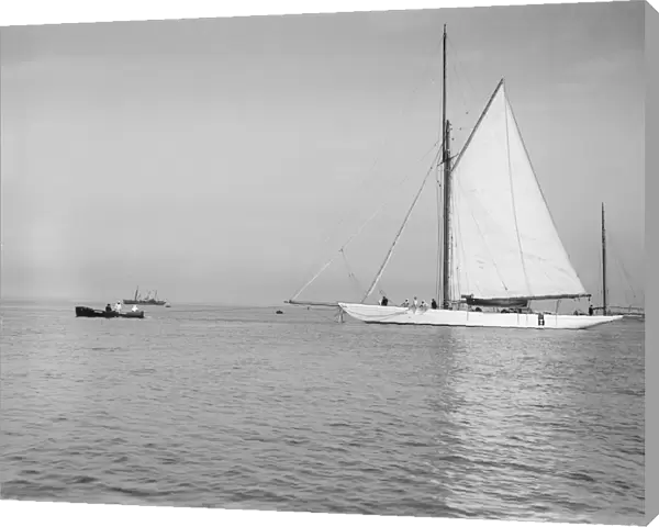 Sailing yacht Bona being towed, 1912. Creator: Kirk & Sons of Cowes