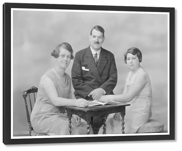 Portrait of two women and a man, c1935. Creator: Kirk & Sons of Cowes