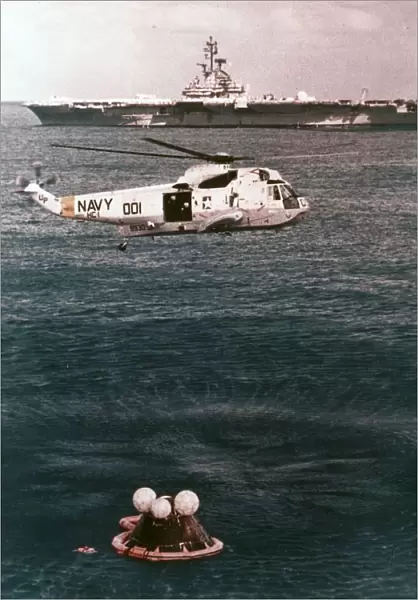 Astronauts being recovered from the sea, Apollo 16 mission, 27 April 1972. Creator: NASA