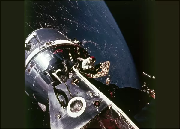 Module pilot David Scott emerging from Apollo 9 spacecraft, 6 March 1969. Creator