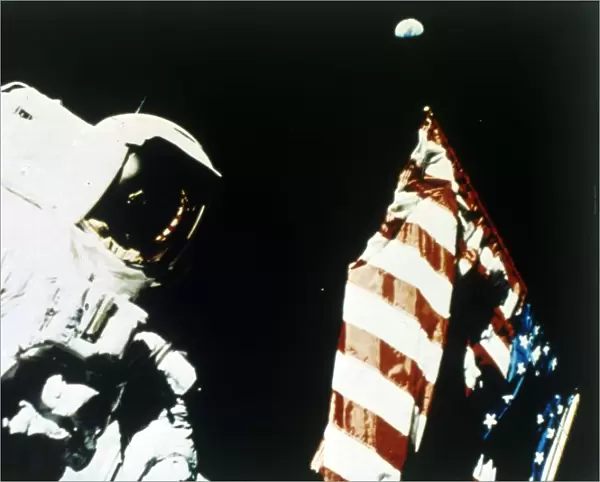 Harrison Schmitt with US flag on the surface of the Moon, Apollo 17 mission, December 1972