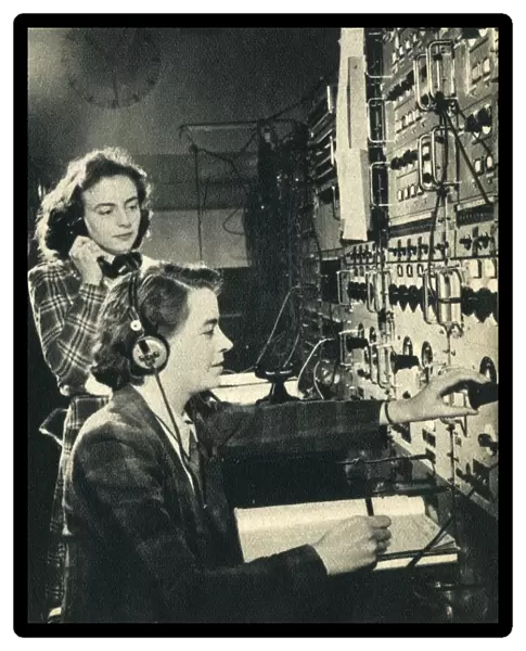 Women have taken over mens jobs. BBC control room as a programme goes on air 1942