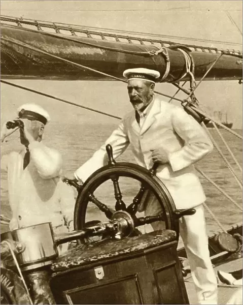 King George V at the wheel of of his yacht, Britannia, during Cowes Regatta week, 1924, (1935)