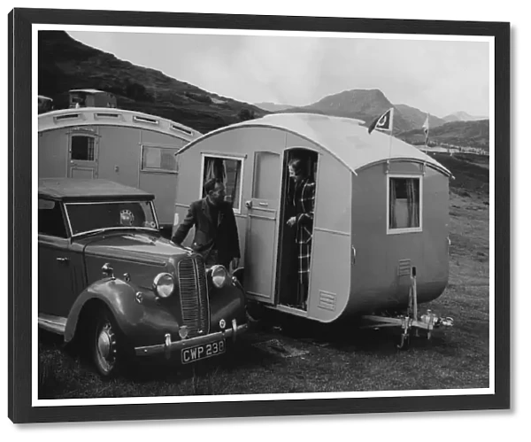 1939 Ausin Big Seven tourer with caravans. Creator: Unknown