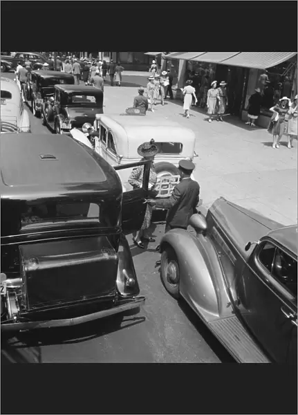Fifth Avenue approaching 57th Street, New York City, New York, 1939. Creator: Dorothea Lange