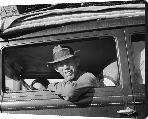 Farmer from Independence, Kansas, on the road at cotton chipping time, U. S. 99, California, 1939. Creator: Dorothea Lange
