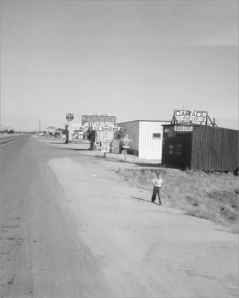 Along the highway U. S. 99 at Highway City, between Tulare and Fresno, California, 1939. Creator: Dorothea Lange