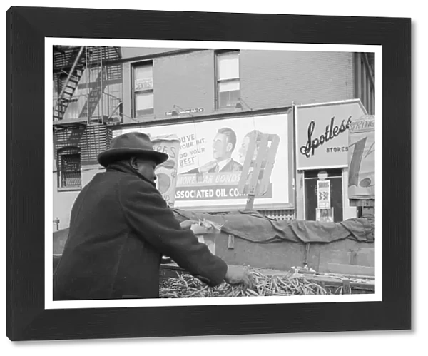 Street peddler in the Harlem section, New York, 1943. Creator: Gordon Parks