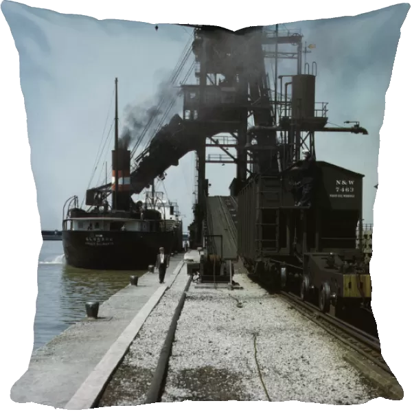 Loading a lake freighter with coal at the Pennsylvania R.R. coal docks... Sandusky, Ohio, 1943. Creator: Jack Delano