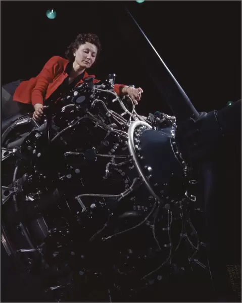 Woman at work on motor, Douglas Aircraft Company, Long Beach, Calif. 1942. Creator: Alfred T Palmer