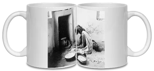 Zuni bread maker, c1903. Creator: Edward Sheriff Curtis