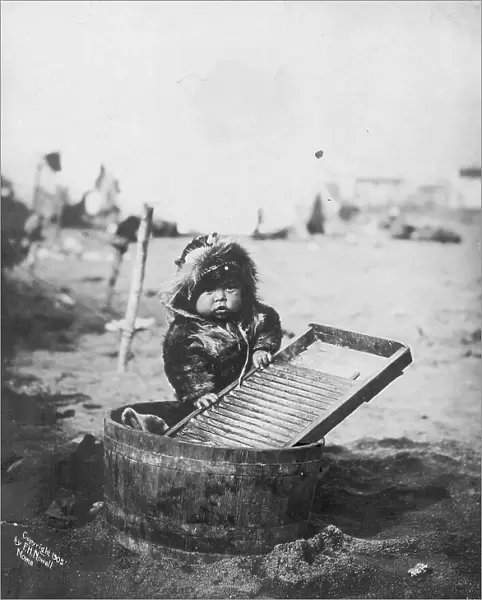 Child at washtub, c1905. Creator: Frank H. Nowell