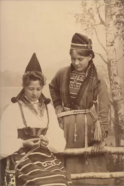 Studio portrait: two women in national costume, 1906. Creator: Helene Edlund