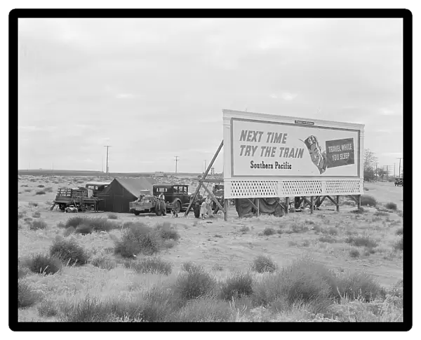 Billboard along U.S. 99...three destitute families...Kern County, CA, 1938. Creator: Dorothea Lange