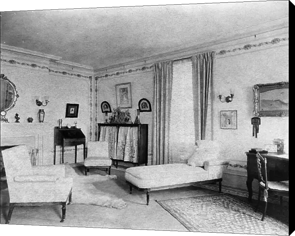 Bedroom with fireplace, padded chaise longue, window, and polar... Greenwich, Connecticut, 1908. Creator: Frances Benjamin Johnston