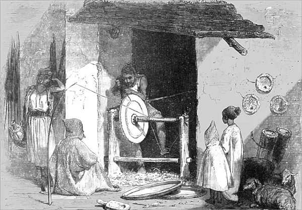 Kabyle Turner at his Wheel; The Natives of Algeria, the Kabyle, the Arab, the Moor, and... 1875. Creator: Unknown