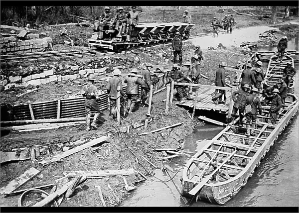 British loading pontoon boats with ammunition, 22 Apr 1917. Creator: Bain News Service