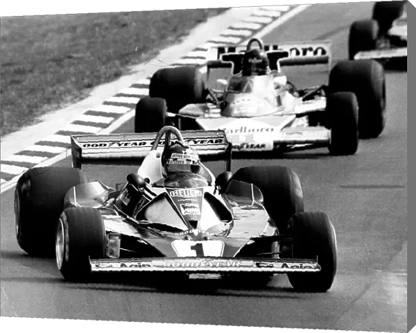 British Grand Prix 1976 Niki Lauda leads James Hunt through the bend