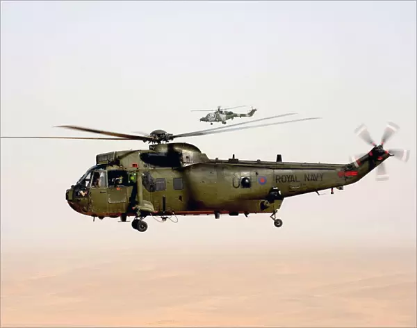 Royal Navy Sea King Mk4 Helicopter Escorted by Army Lynx Mk9A Over Afghanistan