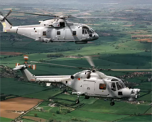 A Royal Navy Merlin (top) and Lynx Mk 8 helicopter