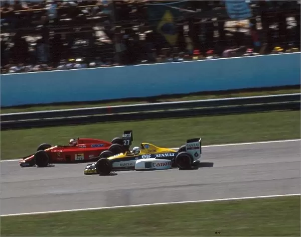 Formula One World Championship: Riccardo Patrese Williams FW12C on the inside of Winner Nigel Mansell Ferrari 640