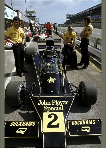 Formula One World Championship: Jacky Ickx debuted the Lotus 76, but retired on lap 32 with brake trouble after colliding with his team mate on the first lap