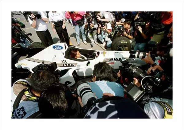 1997 JAPANESE GP. TORA TAKAGI SIGNS FOR TYRRELL FOR 98. PHOTO: LAT