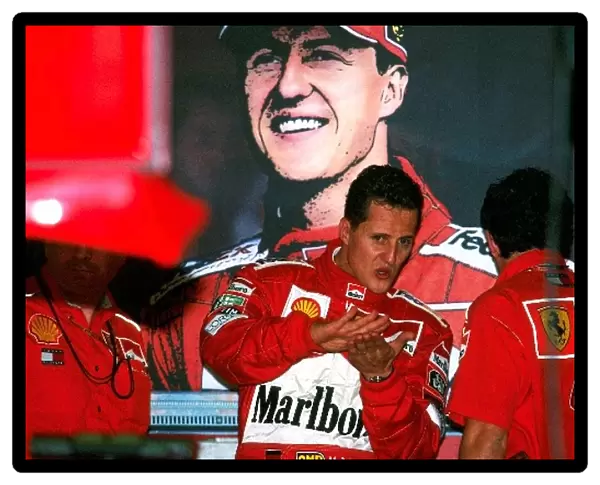 Formula One World Championship: Michael Schumacher Ferrari F1 2000, 2nd place in deep discussion with Ferrari engineers