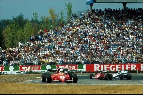 Formula One World Championship: Rene Arnoux Ferrari 126C3 ahead of teammate Patrick Tambay and Nelson Piquet