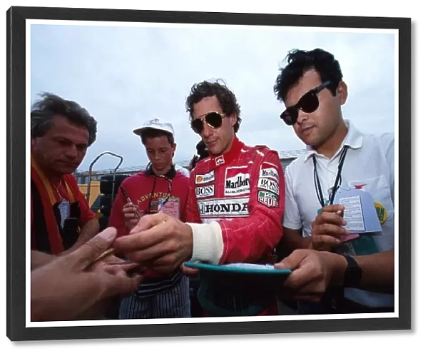 Formula One World Championship: Winner Ayrton Senna McLaren MP4  /  6 signs autographs for the fans