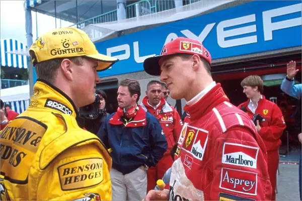 Formula One World Championship: Ralf Schumacher Jordan with brother Michael Schumacher Ferrari