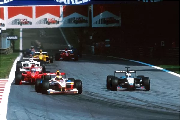 Formula One World Championship: Ralf Schumacher Williams FW21 leads the midfield pack